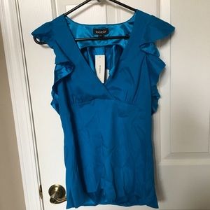 Bebe cut out back blouse