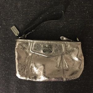 Barely used silver/pewter Coach leather wristlet