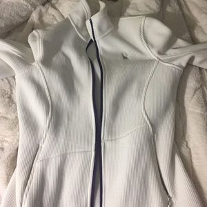Spyder white stretched jacket never worn