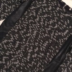 Gently Worn; Black Long Sleeve w/ White Accents