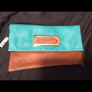 Leather tan and turquoise hand bag