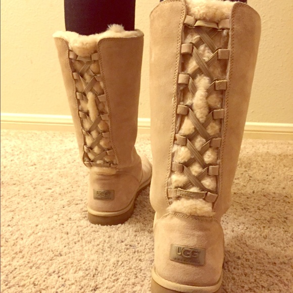 UGG Tall Suede lace up boots.