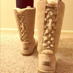 UGG Tall Suede lace up boots.