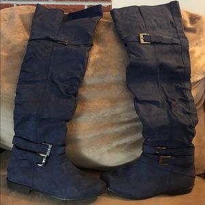 Navy blue suede boots.