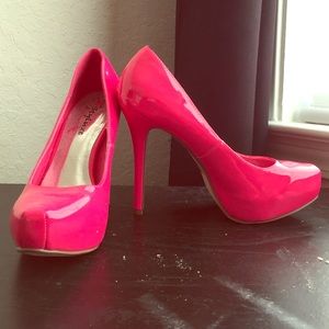 Pink heels by Styluxe