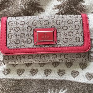 Pink and tan GUESS wallet