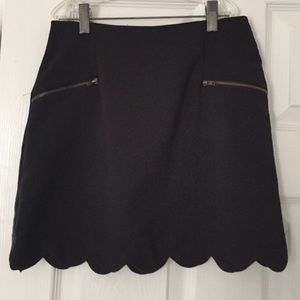 Scalloped black skirt