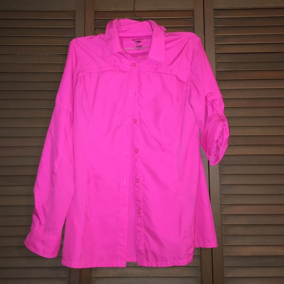 Hot pink reel legends fishing shirt.