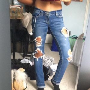 Destroyed ripped jeans