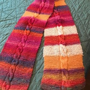 Bright multicolored hand knit pauper scarf