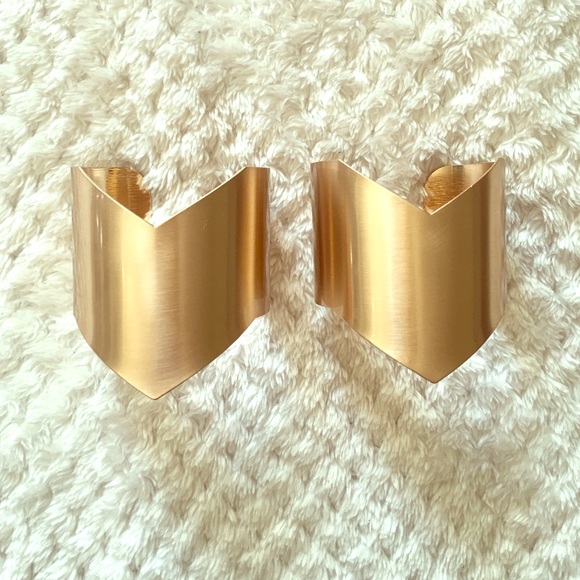 Gold wrist cuffs