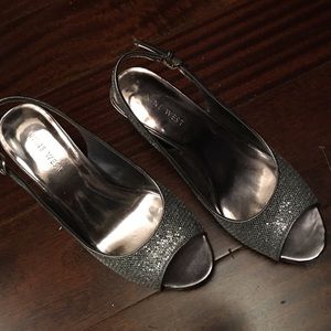 Low heel silver shoe.  Nine West