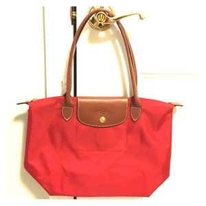 Longchamp Handbags - Longchamp le pliage tote in red. Longchamp Handbags - Longchamp le pliage tote in red.