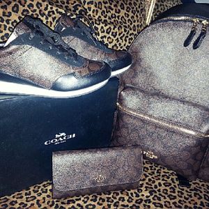 Selling this brandnew signature coach set
