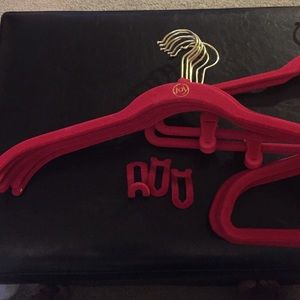 14 red decorative hangers