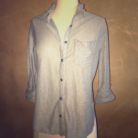 Grey button down blouse.