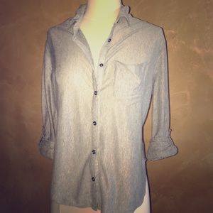 Grey button down blouse.