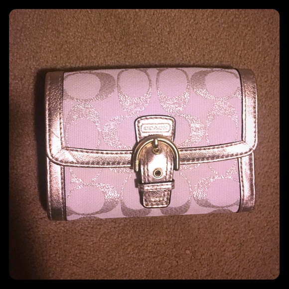 New gold coach wallet with tags. folds into thirds