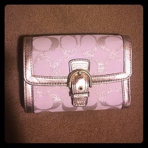 New gold coach wallet with tags. folds into thirds