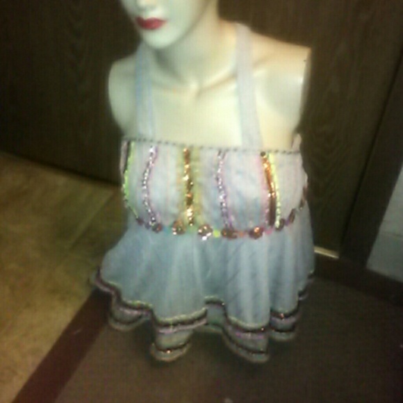 1960s vintage top with embroidery and beadwork.