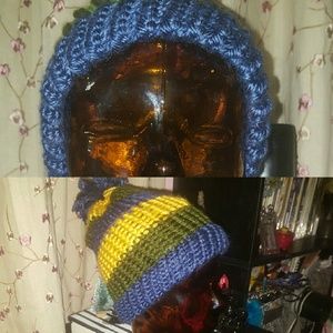 Striped beanie with poof floof