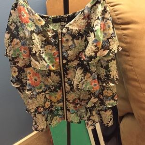 Floral zipper shirt. Never been worn.