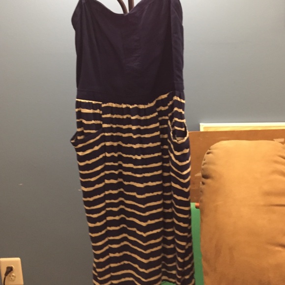 Strapless dress. Never worn. Loose from waist.