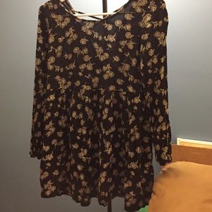 Black dress with white flower pattern.