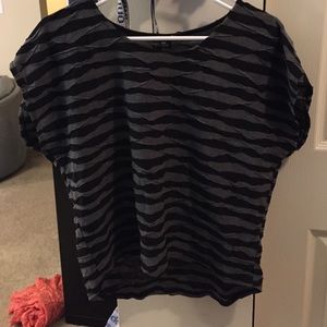Gray and black loose top.