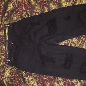 FashionNova black high waist distressed skinnies