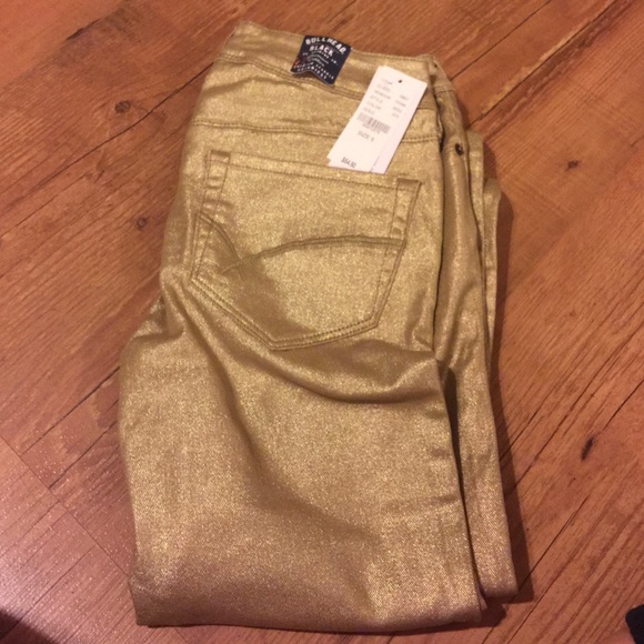 Gold bullhead jeans