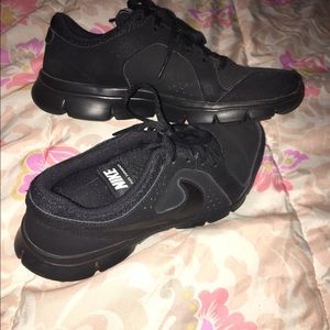 Black Nike athletic shoes