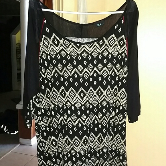 Sky Tops - Tribal print baseball top with red details.