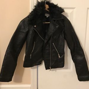 Black leather jacket w/ faux fur collar.