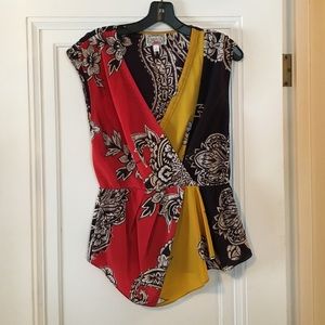 Peplum waist multi color top.