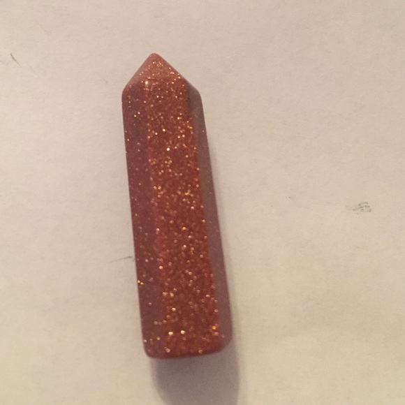 Tiny goldstone crystal point