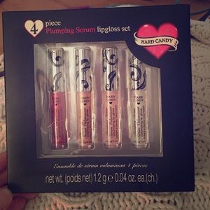 4 piece never used Plumping Serum Lipgloss set