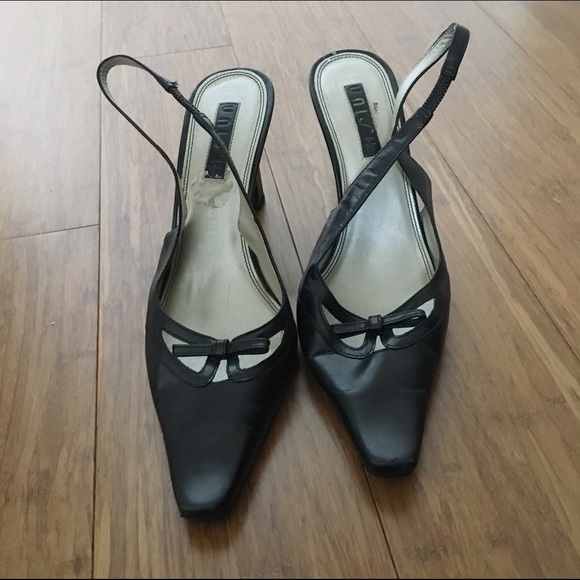 Pointed toe black sling backs