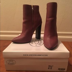 Burgundy booties with a chunky heel.
