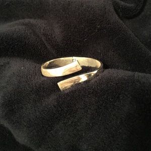 Express silver cross over bracelet