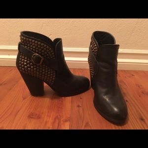 Black and gold studded booties