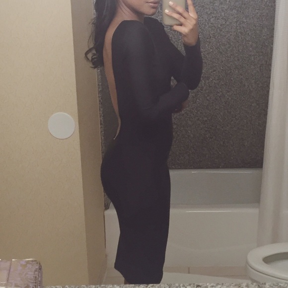 Mid length black dress with open back - Picture 2 of 4
