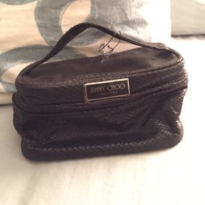 Jimmy Choo makeup/perfume bag.