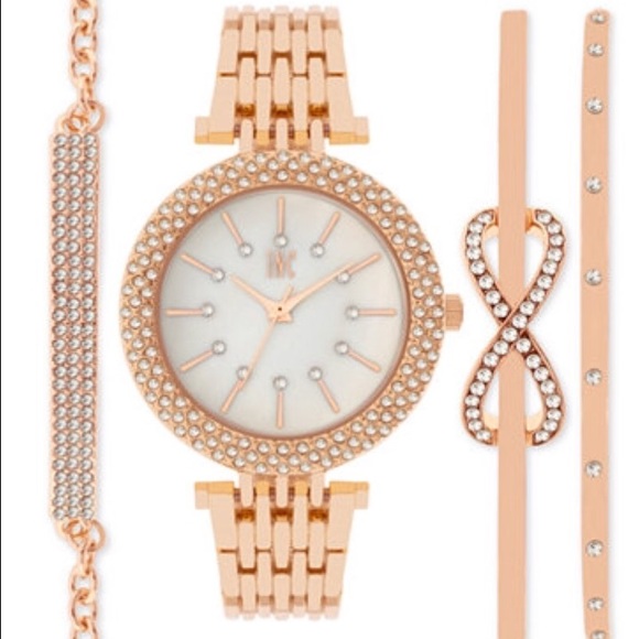INC rose gold tone watch with matching bracelets