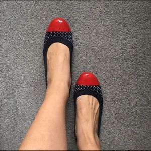 JCrew navy flats with white polka dots and red toe