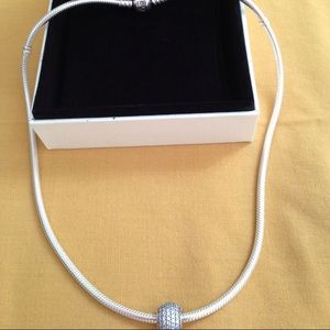 Pandora necklace with a charm included