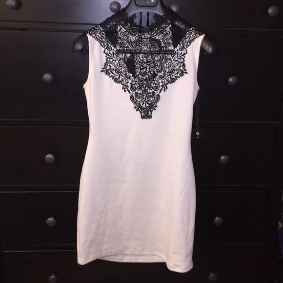 White bodycon dress with black detail