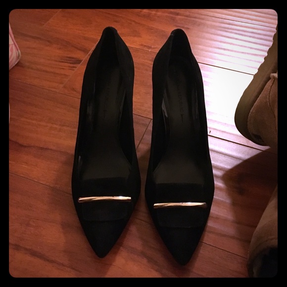 Black suede pumps