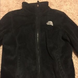 Small North Face fuzzy zip-up jacket.