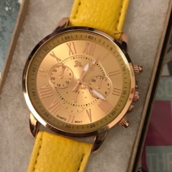 Yellow and gold watch